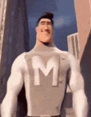 a man in a superhero costume with the letter m on his chest is smiling .