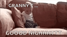 a baby is sitting on a couch and says `` granny t ... good night ! ''