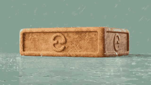 a brick with the letter e on it