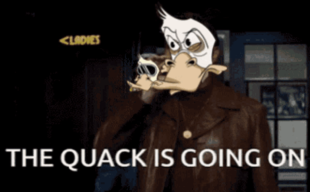 a man wearing a duck mask with the words the quack is going on