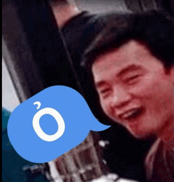 a man with a blue speech bubble that says o on it