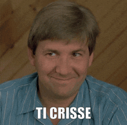 a man in a blue striped shirt is smiling with the words ti crise written on his face