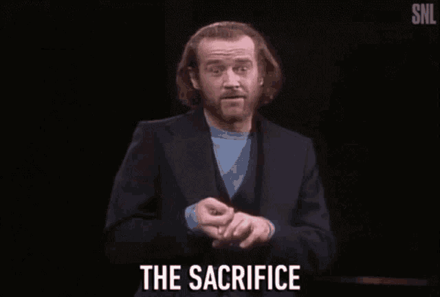 a man in a suit is saying " the sacrifice " in front of a black background