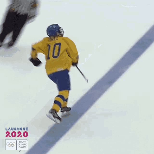 a hockey player with the number 10 on the back of their jersey