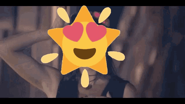 a woman 's face is obscured by a sun with hearts in her eyes