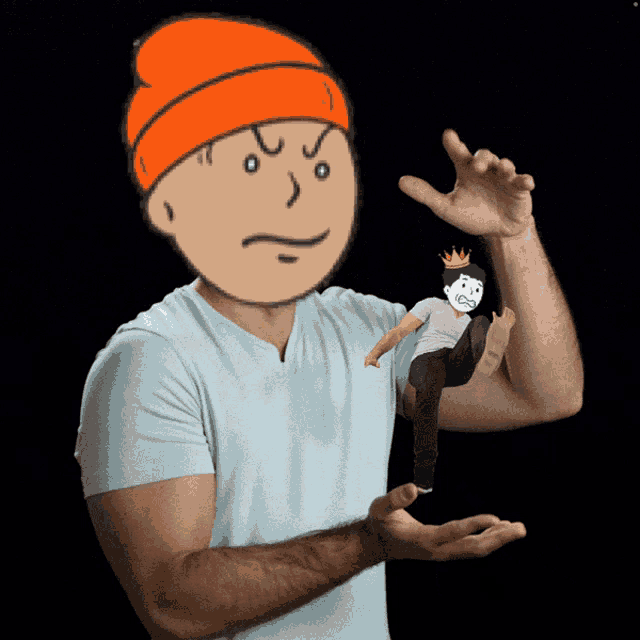a man is holding a cartoon character in his hands