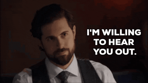 a man with a beard says i 'm willing to hear you out