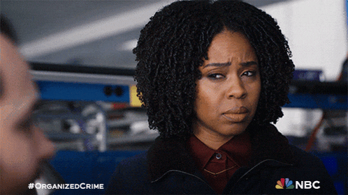 a woman with a serious look on her face is featured in a nbc ad