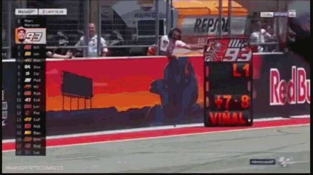 a race track with a scoreboard that says 93 on it