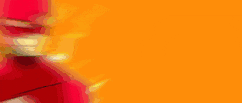 a man in a red hat is standing in front of an orange background