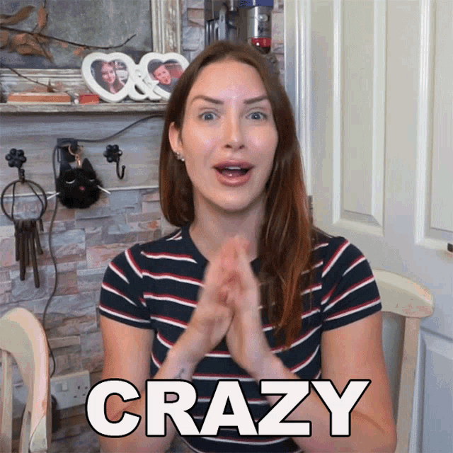 a woman in a striped shirt says crazy