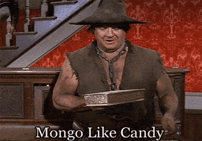 a man in a hat is holding a book that says mongo like candy on it