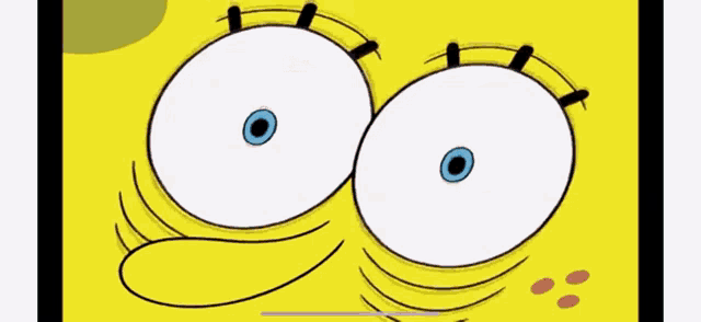 a close up of a cartoon character 's eyes with red blood coming out of them