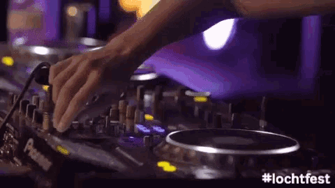 a close up of a dj 's hands on a mixer with the hashtag #lochtfest