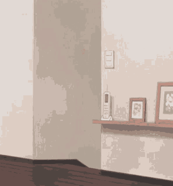 a girl in a santa outfit is peeking out of a doorway