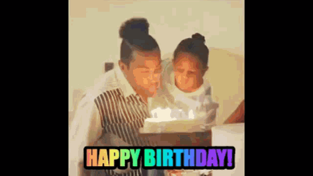 a man and a little girl are blowing out candles on a birthday cake and the caption says happy birthday !