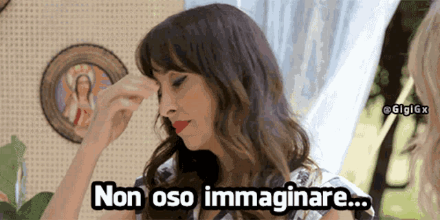a woman wipes her forehead with the words non oso immaginare written below her