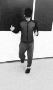 a man in a black and white photo is running