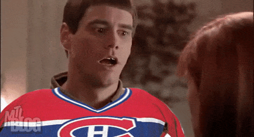 a man is wearing a montreal canadiens jersey
