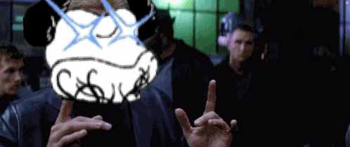 a man in a suit holds up a drawing of a panda with a cross on his face