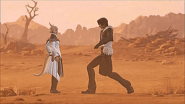 a man and a woman are standing in a desert looking at each other