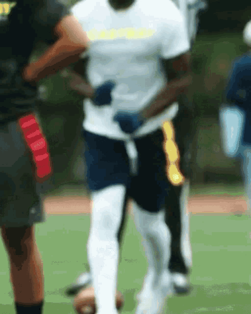 a man wearing a shirt that says ' ucsd ' on it