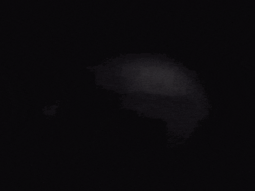a close up of a person 's eye in a black and white photo