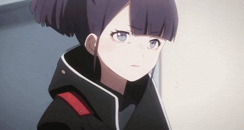 a girl with purple hair is wearing a black jacket