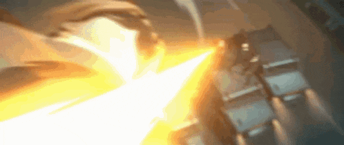 a close up of a person holding a sword with a glowing beam coming out of it .