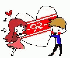 a boy and a girl are holding a large heart .