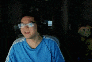 a blurry picture of a man wearing headphones