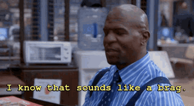 a man in a striped shirt and tie says i know that sounds like a brag