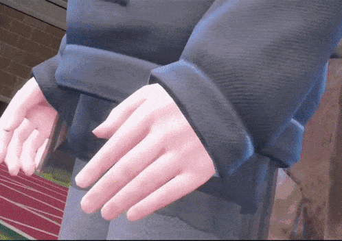 a close up of a person 's hands with a pink nail polish