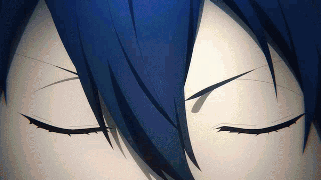 a close up of a person 's eyes closed