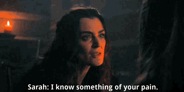 a woman says sarah i know something of your pain in a dark room