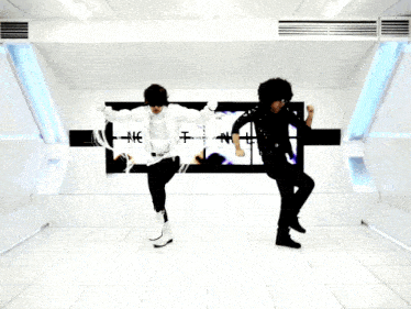 two people are dancing in front of a sign that says ' no '