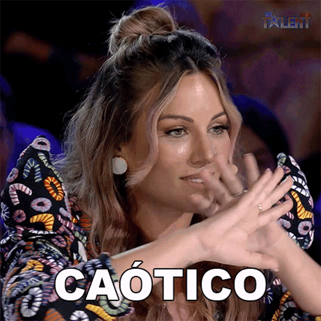 a woman making a face with the word caotico in the corner