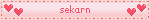 a pink background with hearts and the name sekann on it