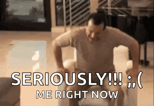 a man is doing push ups on a couch with the words seriously me right now .