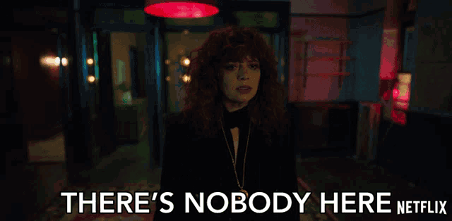 a woman says there 's nobody here netflix in front of a red light