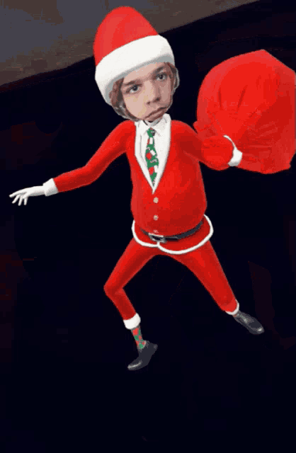 a person dressed in a santa suit and hat is flying through the air
