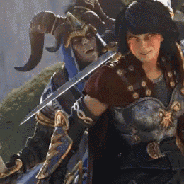 a man with horns is standing next to a woman with a sword