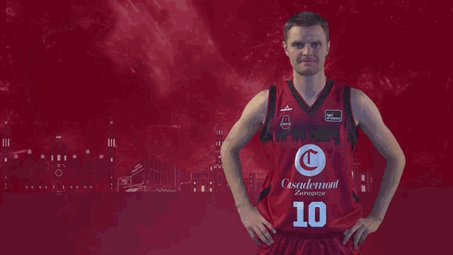 a basketball player wearing a red jersey with the number 10 on it