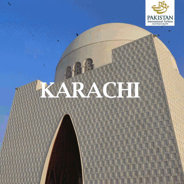 a large white building with the word karachi on it