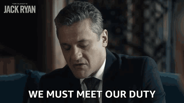 a man in a suit and tie is sitting on a couch with the words we must meet our duty below him