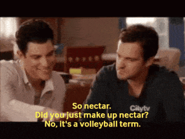 two men are sitting at a table and one of them is saying " so nectar "