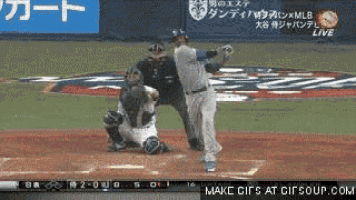 a baseball game is being played on a screen that says make gifs at gifsoup.com on it