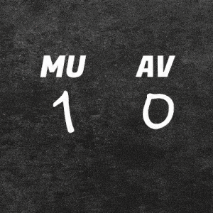 a black and white photo of a man with the letters mu and av visible