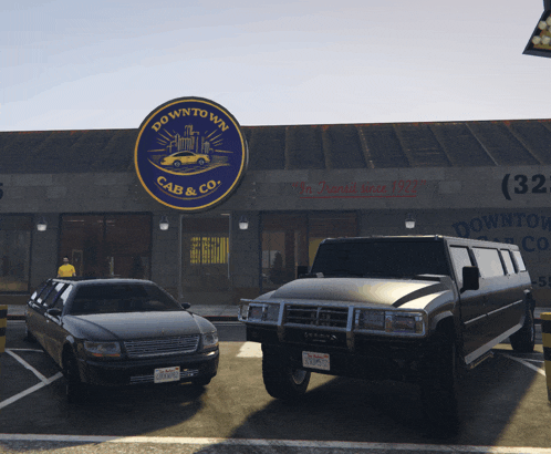 two cars are parked in front of the downtown cab & co.