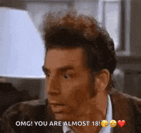 a man in a suit is talking to another man and says `` omg ! you are almost 18 ! ''